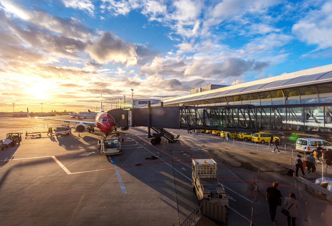 An airplane at an airport that uses a Flight Data Monitoring System (FDMS) to operate more efficiently.