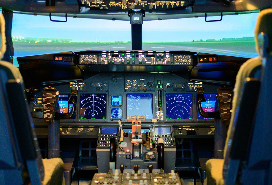 Aviation engineer analyzing Instrument Flight Procedures (IFP) charts on a digital screen, highlighting modern navigation planning.